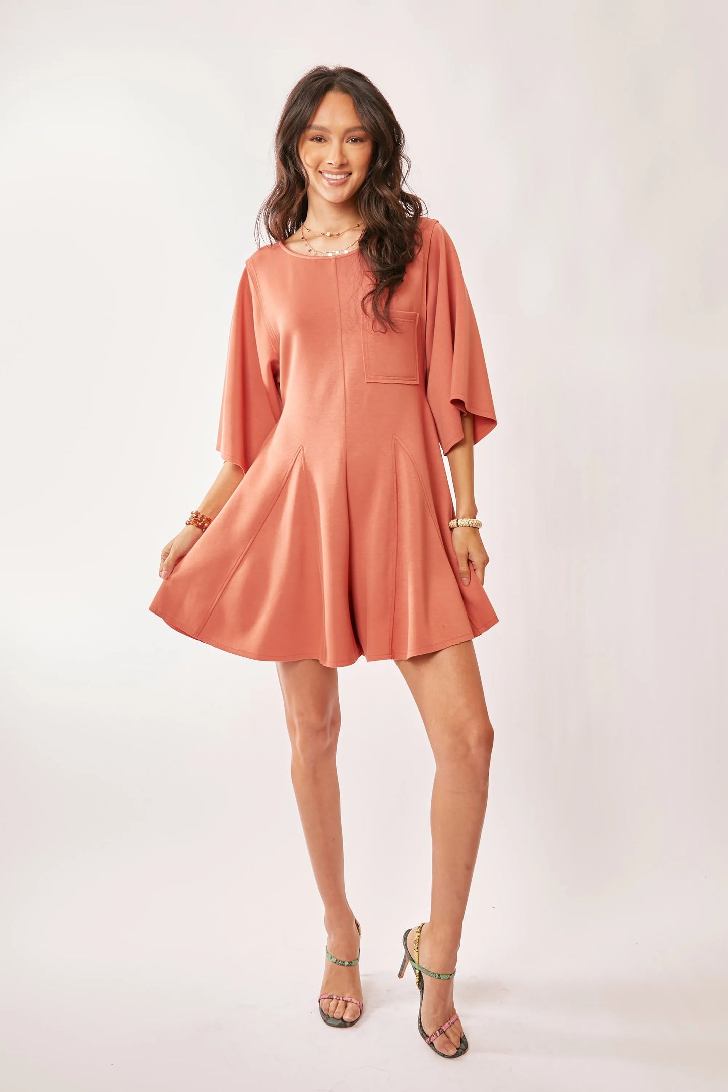 Davi & Dani coral draped sleeve ties back skort romper with flared skirt