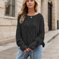 Black cable-knit round neck dropped shoulder long sleeve sweater