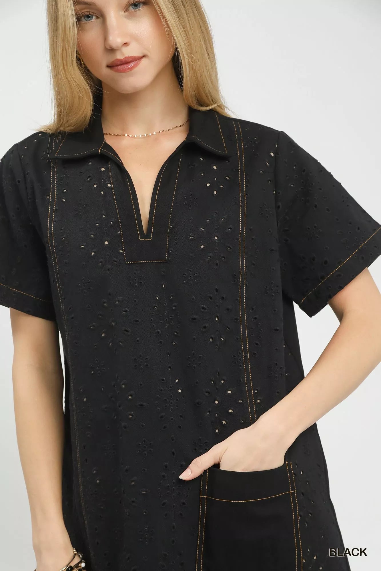 Black eyelet Umgee short sleeve shift dress with gold stitching, collar and pocket