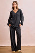 Dark gray ribbed knit loungewear set with V-neck top and pants