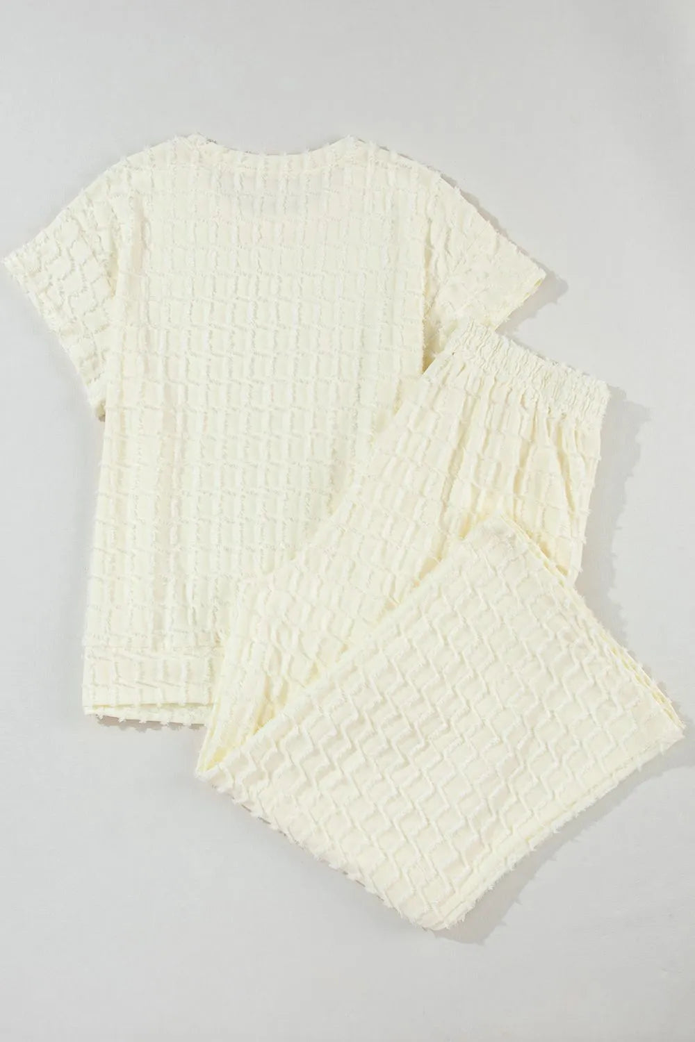 Daverri textured cream short-sleeve top and pants set