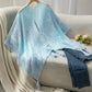 Daverri openwork tassel gradient knit cover up poncho in light blue