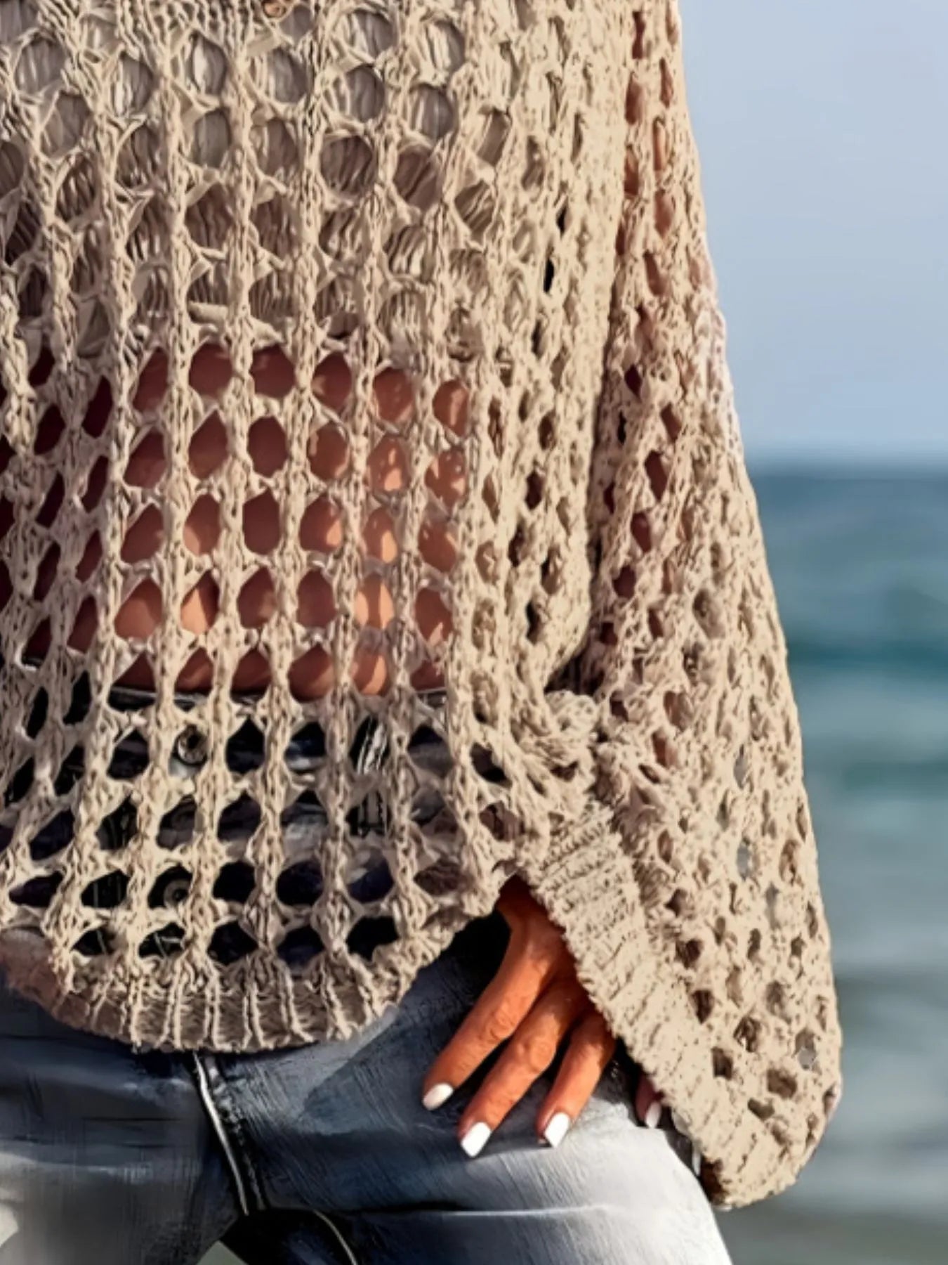 Beige open-knit crochet sweater loose fit textured pattern back view