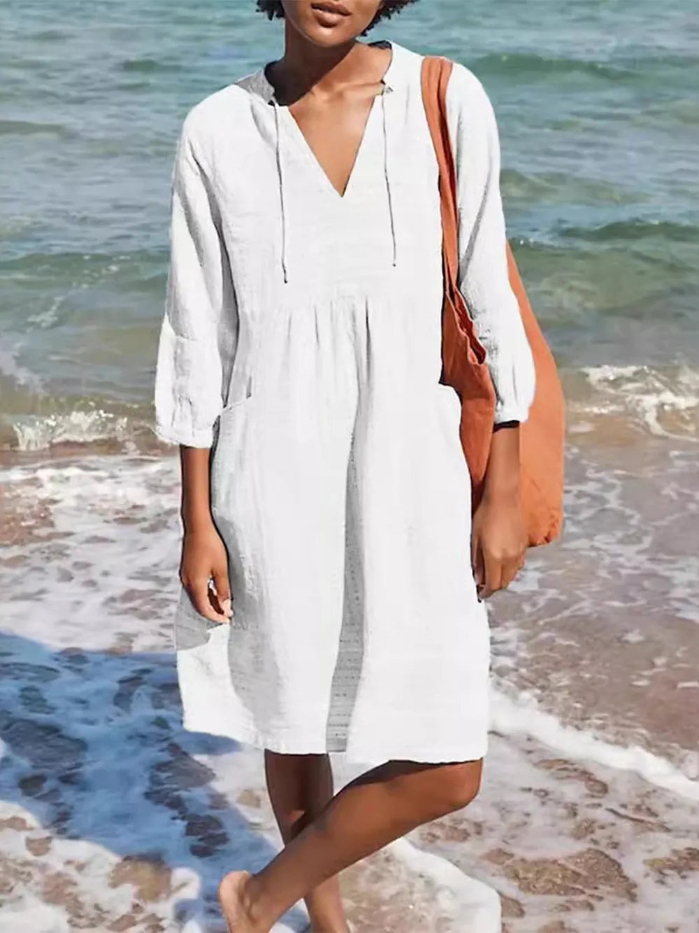 Full size tied three-quarter sleeve mini dress in soft white linen with V-neck