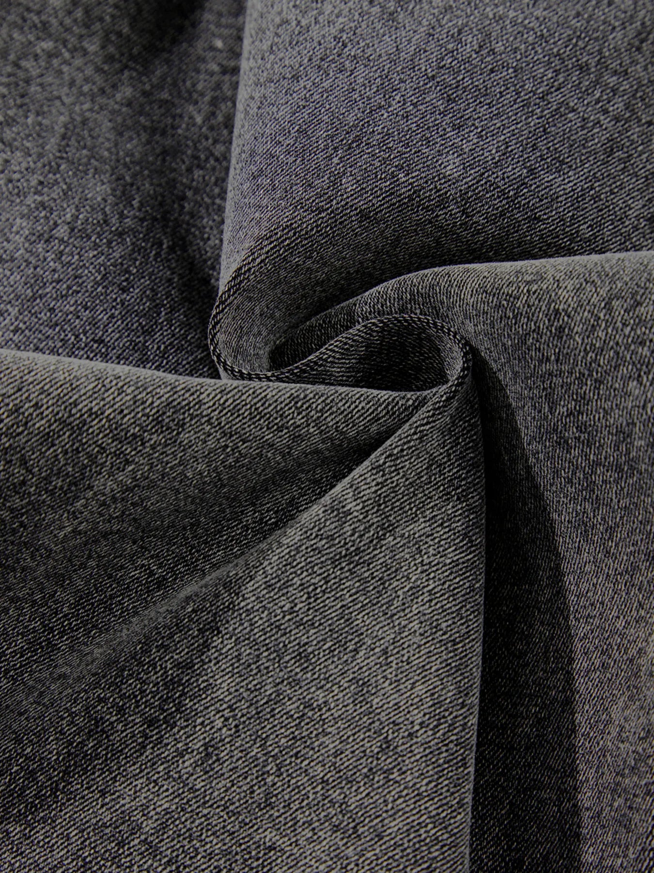 Charcoal gray textured sweater with raw hem jeans from Daverri Fashions