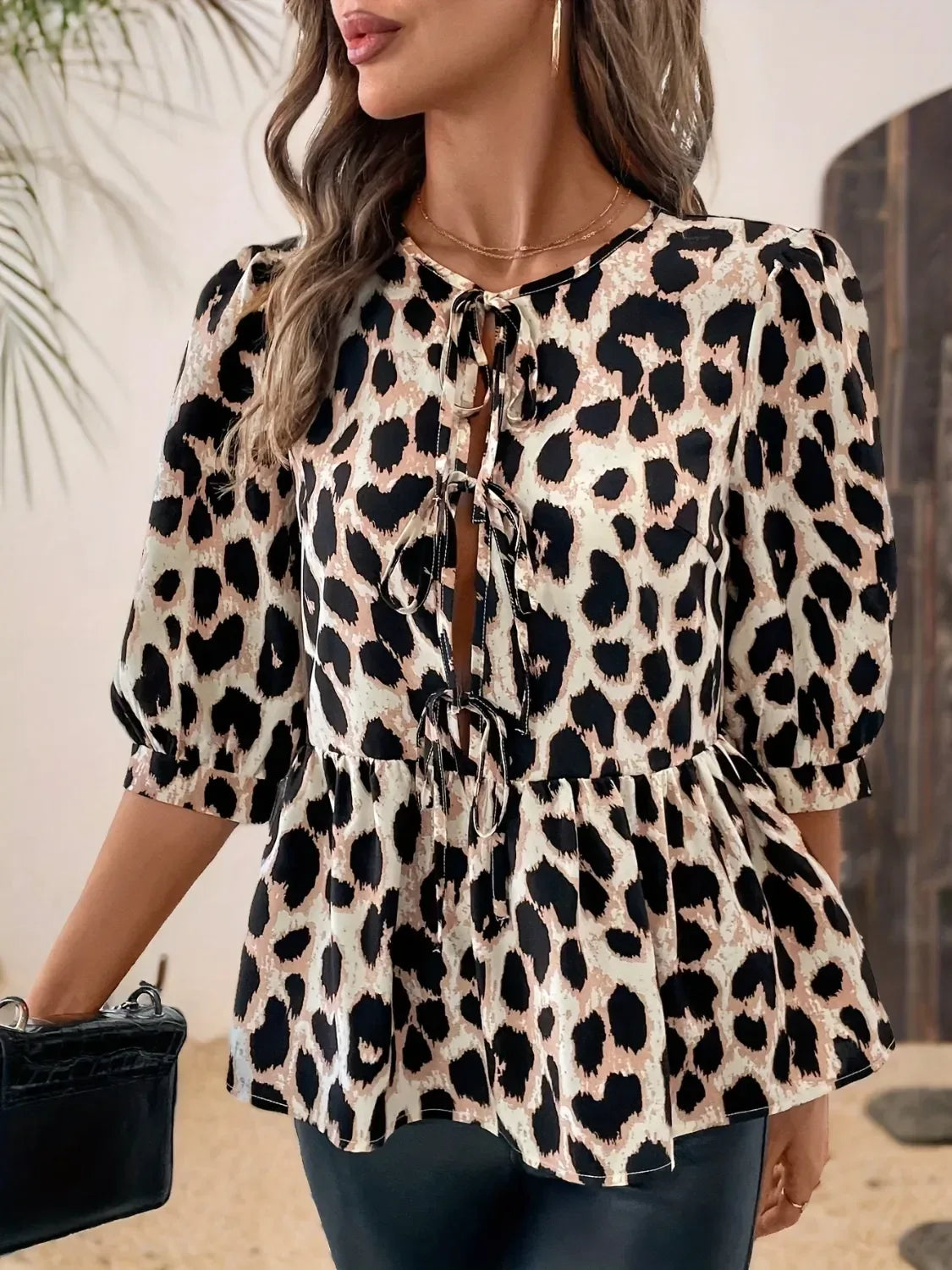 Tied Leopard Round Neck Half Sleeve Blouse - DAVERRI FASHIONS