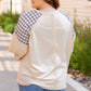 Cream beige satin top with plaid raglan sleeves and peace heart graphic