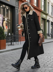 Black shearling-lined longline denim jacket with button closure and lace-up boots
