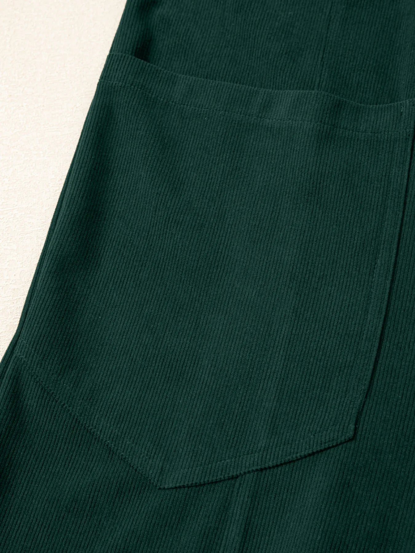 Dark green ribbed corduroy pocket on womens V-neck sleeveless jumpsuit
