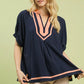 Umgee navy blue linen V-neck blouse with peach trim