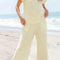 Daverri textured round neck top and pants set in pale yellow
