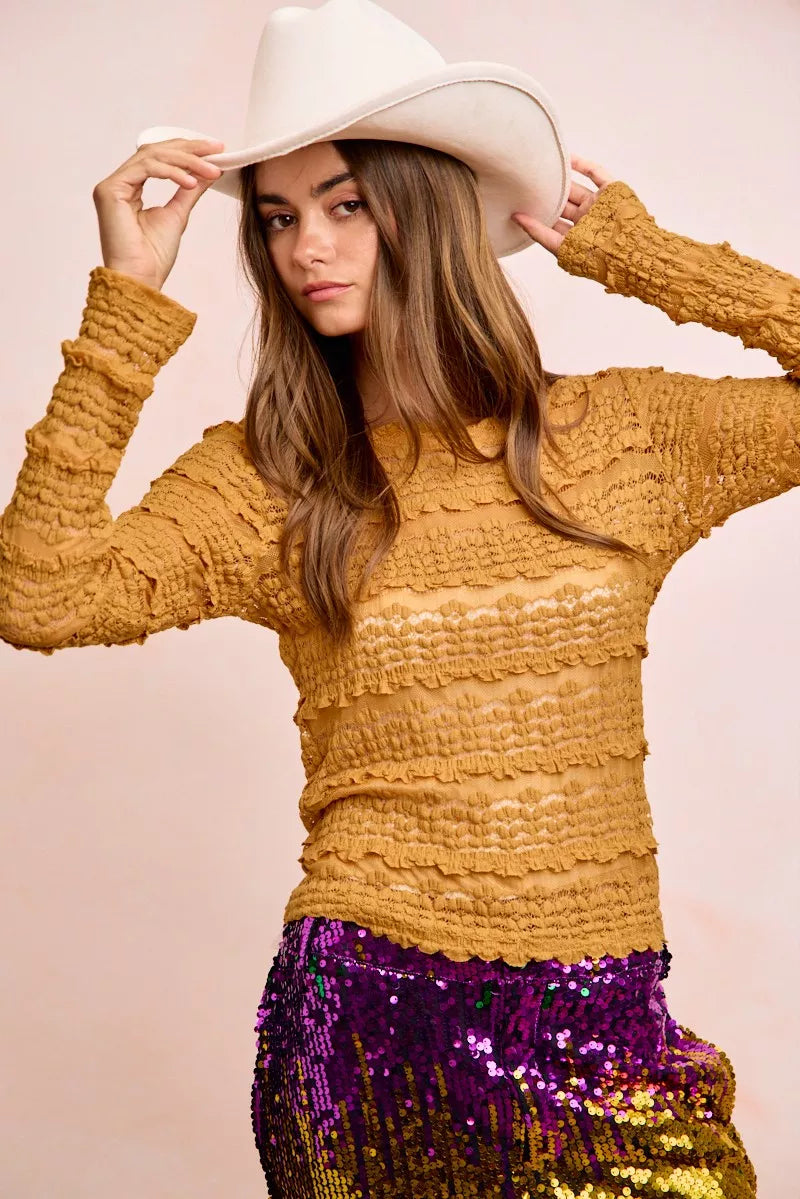 Mustard yellow textured sweater with fringed ruffle details