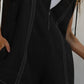 Black sleeveless Half Zipped Hooded Romper with front zipper and textured trim