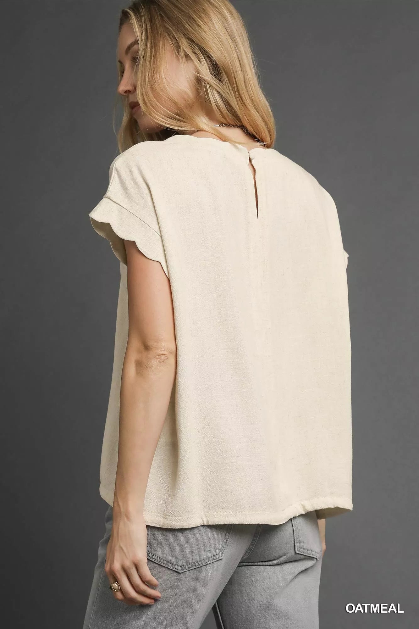Umgee Linen Scalloped Round Neck Top in oatmeal with ruffles and back zipper