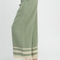 Sage-colored Umgee lace trim fringe hem linen cotton wide-leg pants