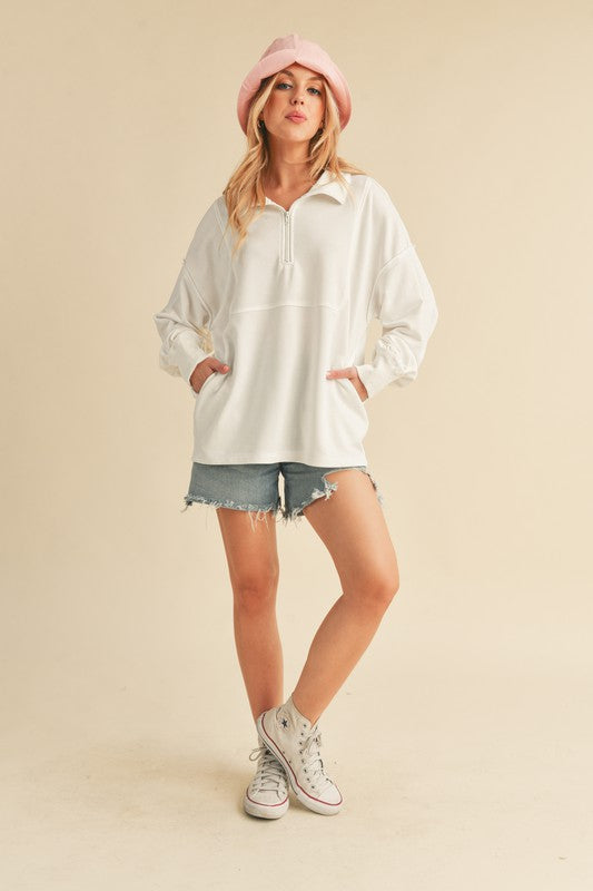 Aemi+Co Exposed Seam Half Zip Drop Shoulder Sweatshirt