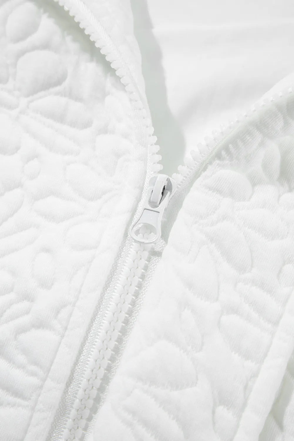 Women’s white quilted baseball collar jacket with silver zipper