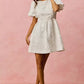 White SO ME floral jacquard mini dress with puffed sleeves and fitted waist