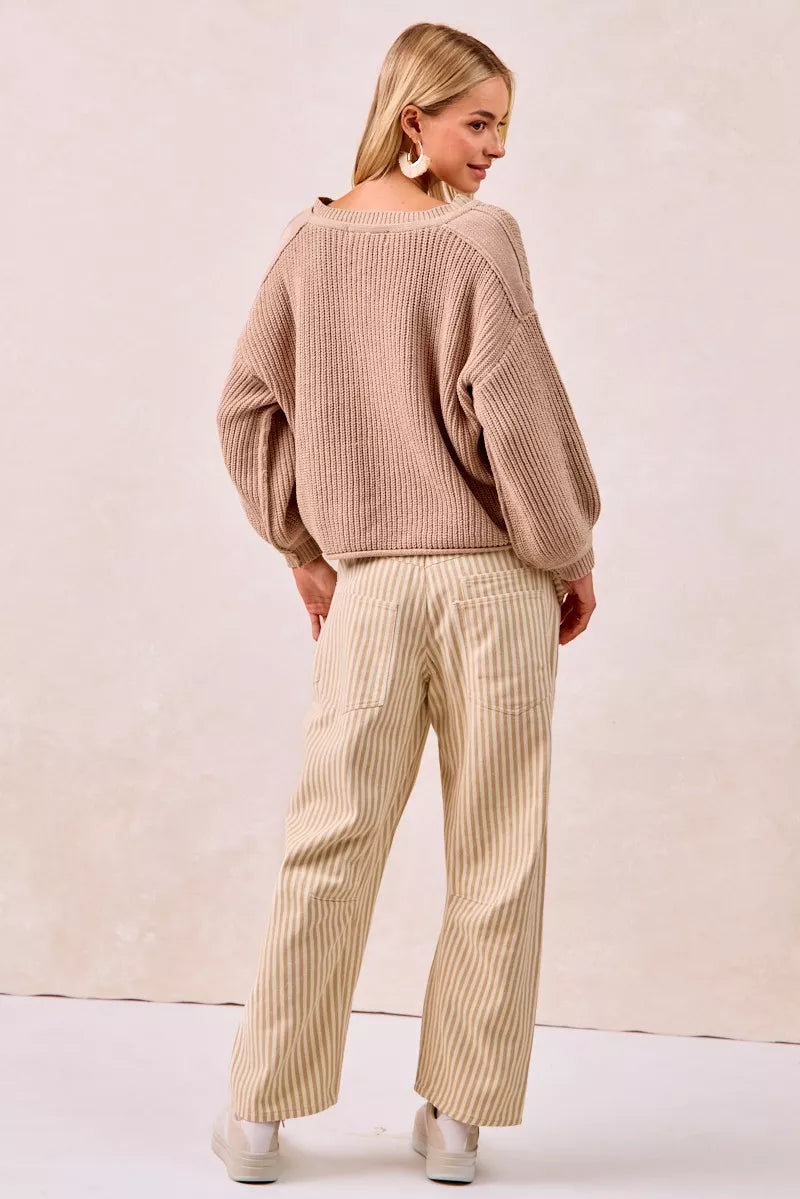 Cozy beige ribbed knit sweater with balloon sleeves over BiBi Drawstring Striped Twill Barrel Pants Oatmeal
