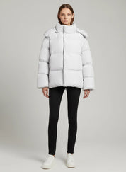 White pocketed zip-up hooded puffer jacket with ruffled sleeves
