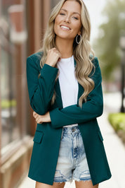 City Chic Green Blazer with pocket details and denim shorts
