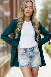 City Chic green blazer with distressed denim shorts and white t-shirt