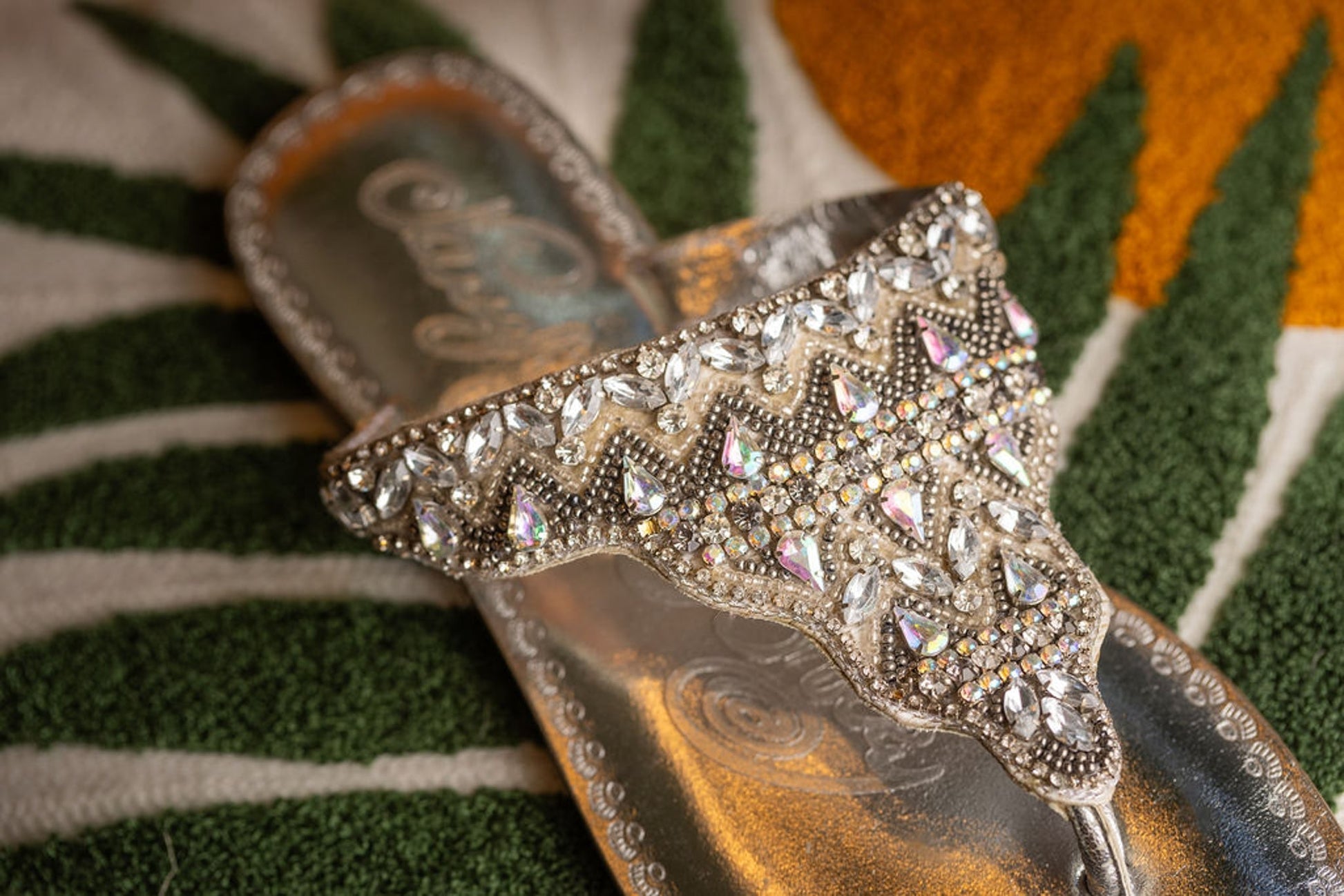 Silver Loving U thong sandals with iridescent rhinestone zigzag strap