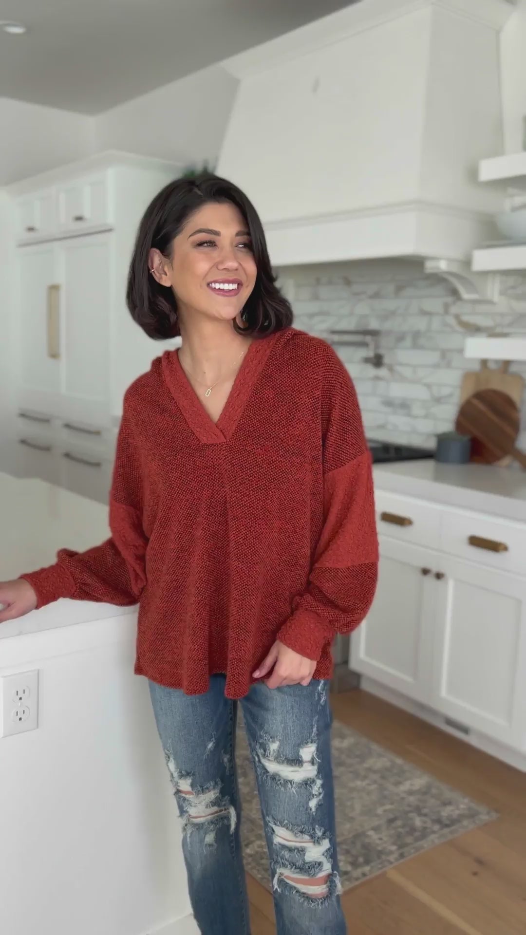 Video of a models posing in a Haptics color block hoodie top-best seller