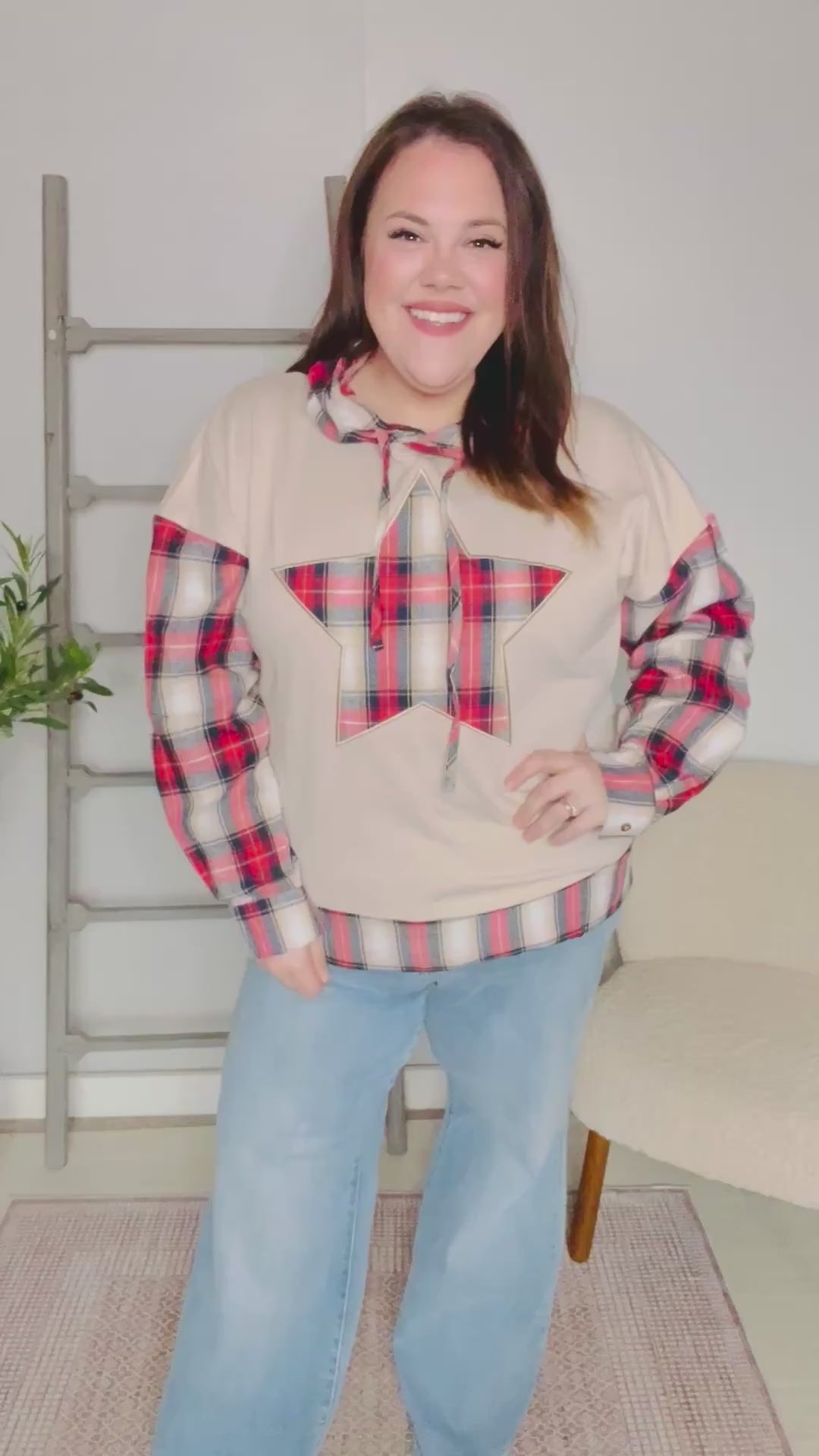 Video of a woman giving details of the Haptics star-patch cotton hoodie