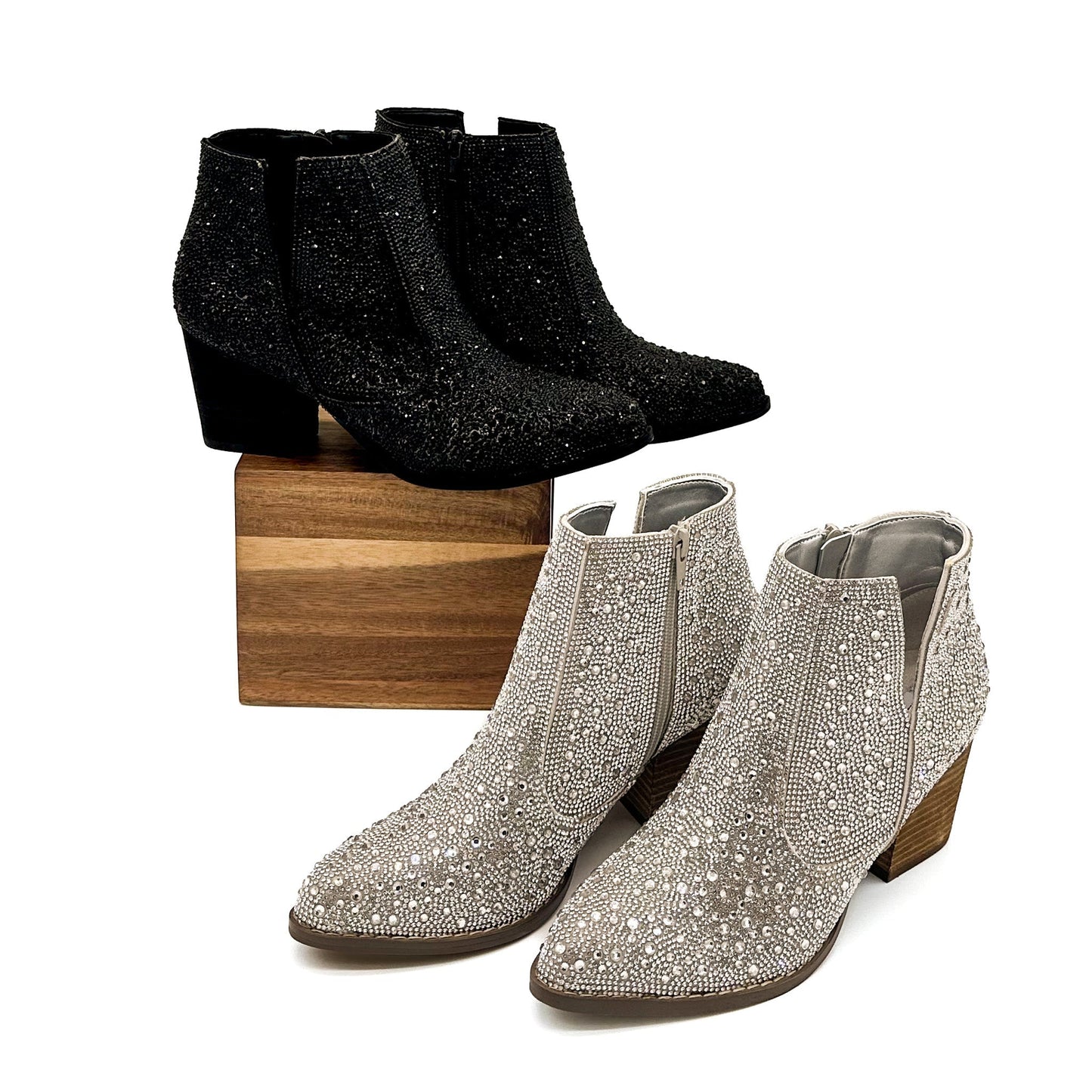 Shiny silver Shine Star rhinestone ankle booties with black glitter and chunky heels