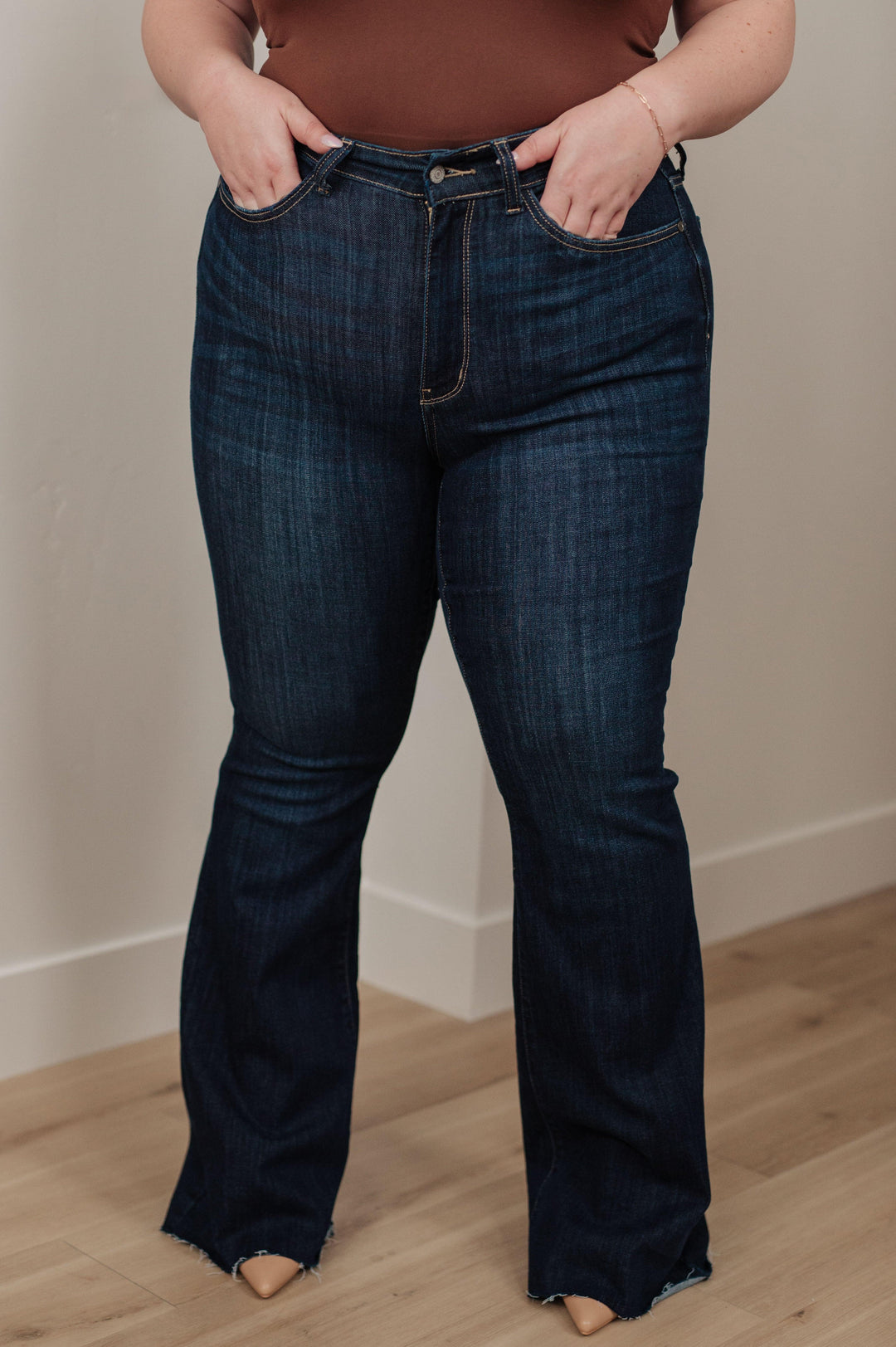 Plus High Rise Judy Blue Raw Hem Flare Jeans Jeans